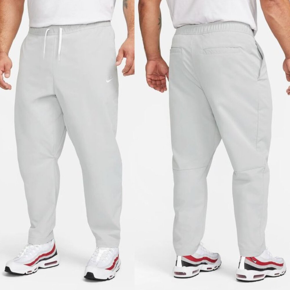 NWT Nike Men's Club Woven Tapered Leg Pants in Light Smoke Grey/White